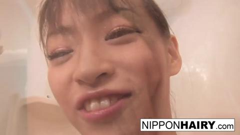 Water-logged Japanese teen with luscious hairy muff loves getting steamy, sloppy and soaked