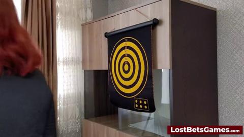  Sexy redhead plays strip darts game