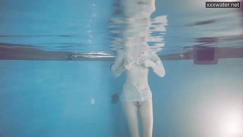 Sasha goes naked into the pool